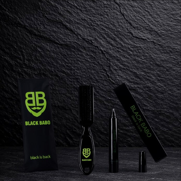 Black BaBo Pen Set: Bartstift und Bürste mit Verpackung auf Schiefer
