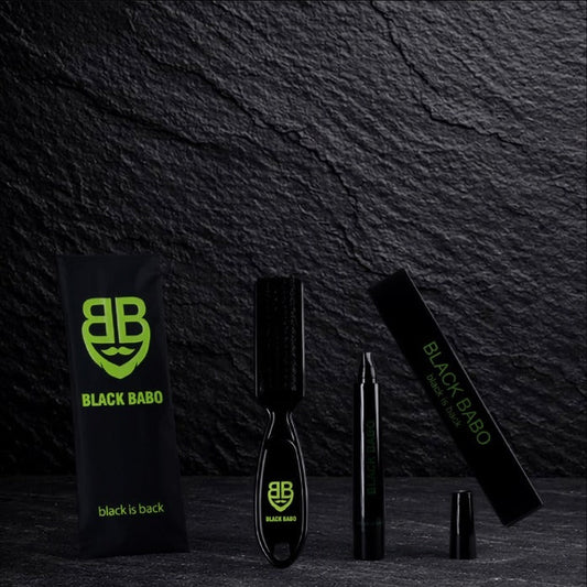 Black BaBo Pen Set: Bartstift und Bürste mit Verpackung auf Schiefer